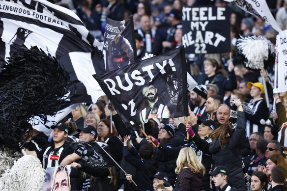 The Magpie army celebrate.