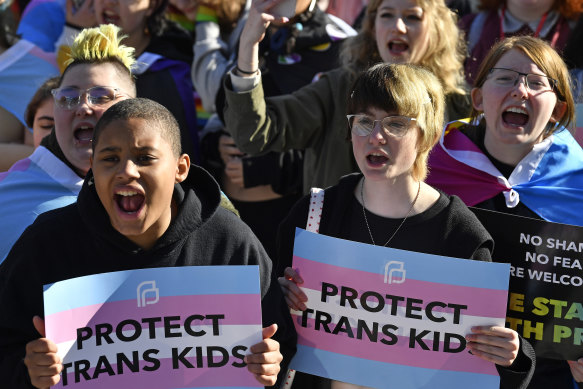 Protesters rally against a Kentucky bill that forbids trans and nonbinary students from using the school bathrooms they identify with among other measures.