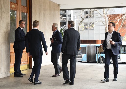 Men arrive at the men’s only Australian Club for the vote on whether to allow women as permanent members.