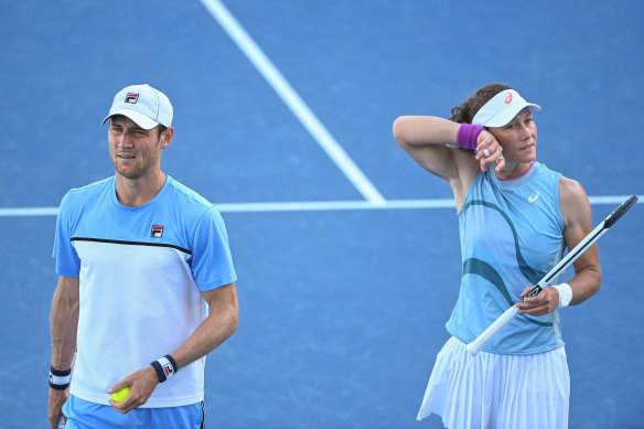 Matthew Ebden and Sam Stosur take a moment in Friday night’s semi final. 