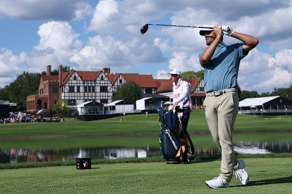 Scottie Scheffler hits his tee shot on the 16th hole in his final round.