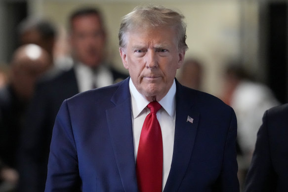 Former President Donald Trump arrives at Manhattan criminal court.