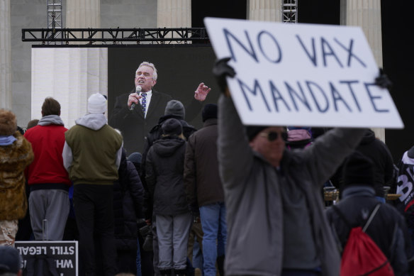 Robert F. Kennedy jnr, is broadcast on a large screen as he speaks during an anti-vaccine rally in front of the Lincoln Memorial in Washington.