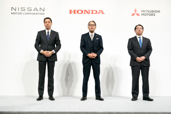 Nissan Motor chief executive Makoto Uchida and Honda CEO Toshihiro Mibe in Tokyo this week with Mitsubishi Motors president Takao Kato.