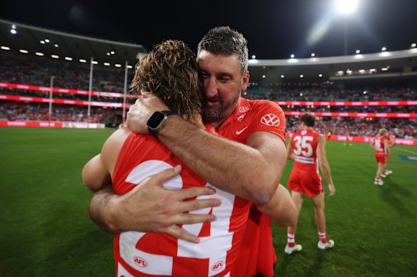 Sydney’s Dane Rampe with coach Dean Cox after full-time.
