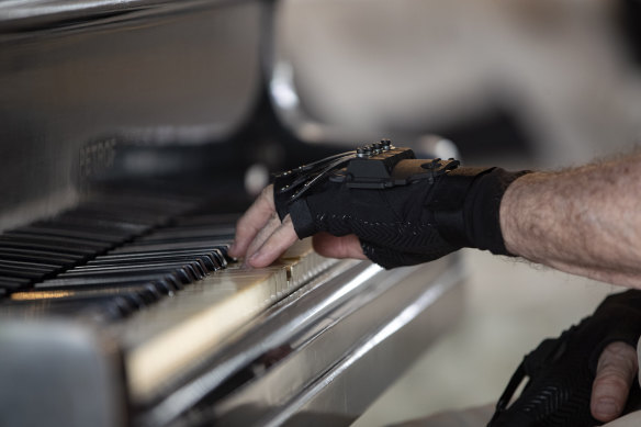 Joao Carlos Martins' new gloves have allowed the pianist to come out of retirement. 