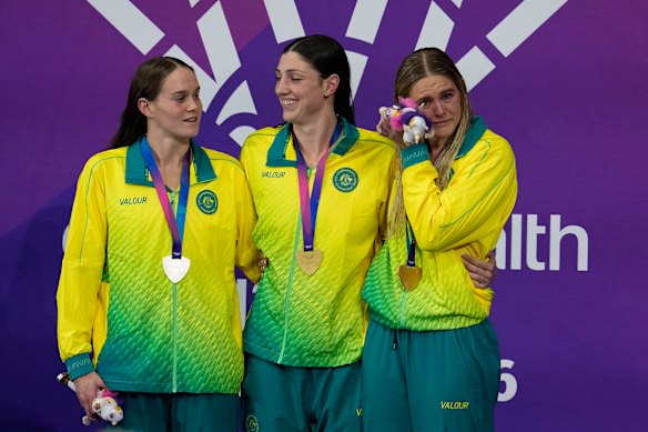 Silver medallist Alex Perkins, gold medallist Meg Harris and bronze medallist Shayna Jack.