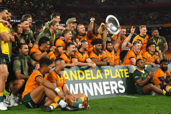 The Wallabies celebrate their Mandela Plate victory.