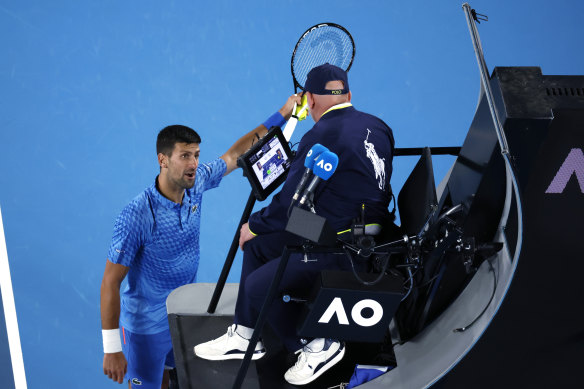 Novak Djokovic of Serbia argues with the chair umpire about a spectator. 