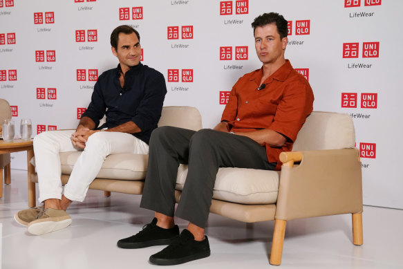 Adam Scott, right, with Roger Federer, left, at a press conference in Melbourne on Monday. 