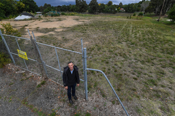 
Associate professor Ian McShane, from RMIT’s Centre for Urban Research, at a Castlemaine school site being prepared for sale. 
