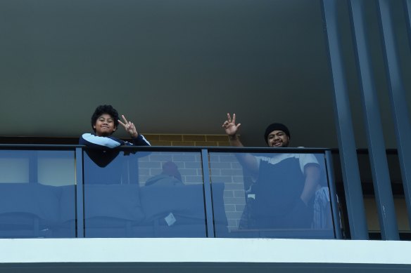 Residents on their balcony at Warby Street, Campbelltown. 