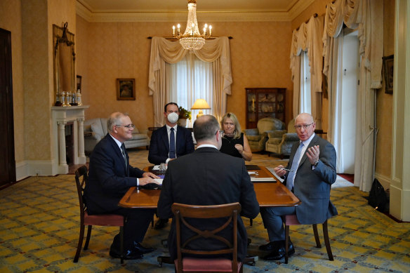 Prime Minister Scott Morrison and Governor-General David Hurley in an executive council meeting to sign off on the amended sanctions on Thursday morning.