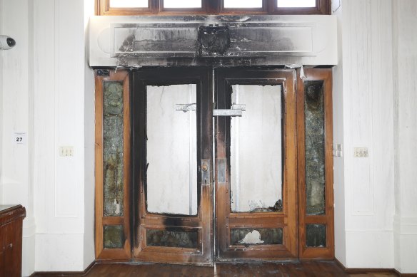 Old Parliament House’s front doors, which date from 1927, were damaged in a fire and protest last week.