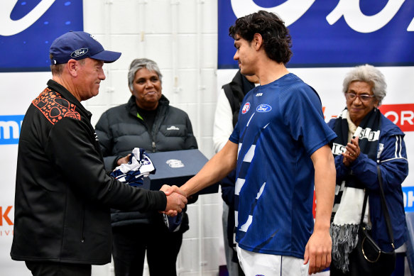 Lawson Humphries’ attitude has impressed Geelong as much as his football, with his dad Ross presenting him with his debut jumper.