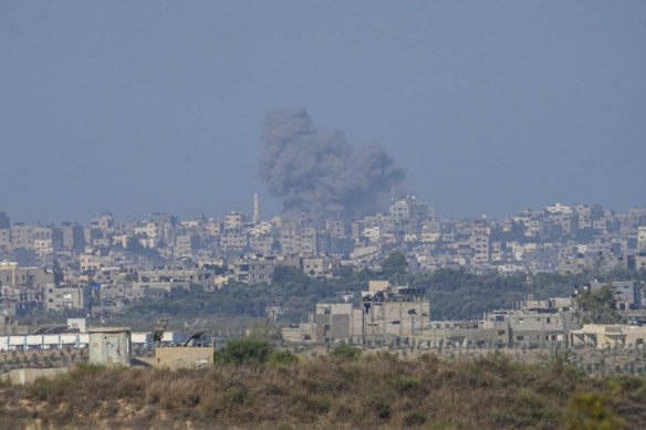 Smoke rises following an Israeli airstrike in the Gaza Strip on Sunday.