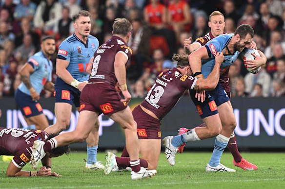 Isaah Yeo is tackled by Patrick Carrigan as he takes another strong carry.