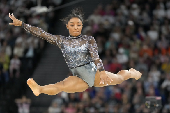 Simone Biles competes on the floor exercise during the women’s artistic gymnastics qualification round.