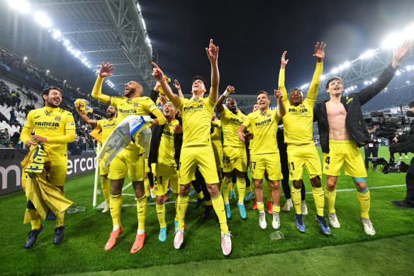 Villareal celebrates their upset win.