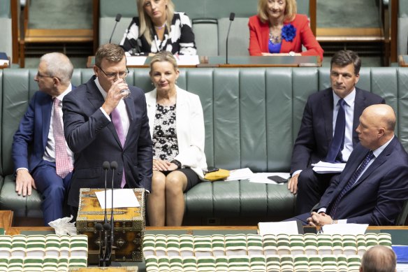 Tudge became emotional and paused for water during his speech.