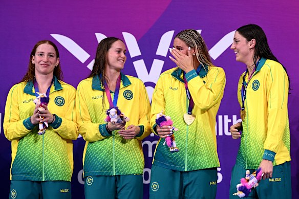 Shayna Jack wipes away tears after the Australian anthem plays following the medal presentation for the women’s 4x100m freestyle relay. 