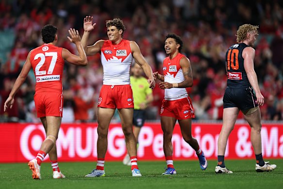 Charlie Curnow of the Swans celebrates kicking a goal