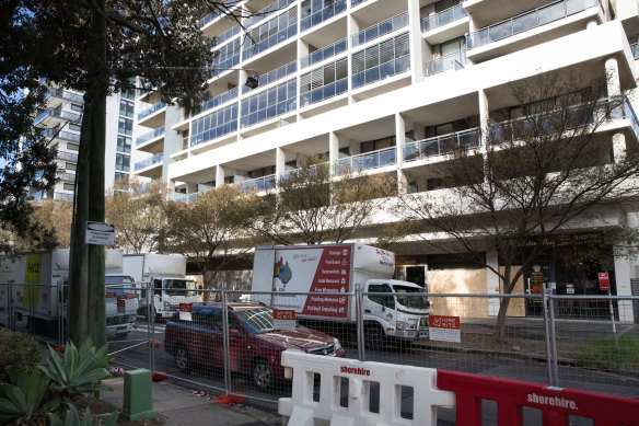 Moving vans outside Mascot Towers on Tuesday.