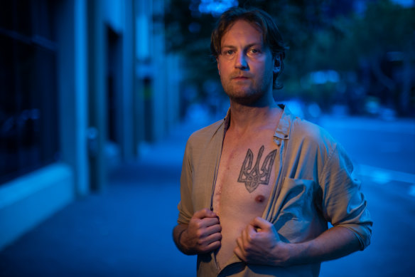 Nick Janiw, who has the Ukrainian coat of arms tattooed on his chest, plans to help with food and medical supply distribution in the war zone.