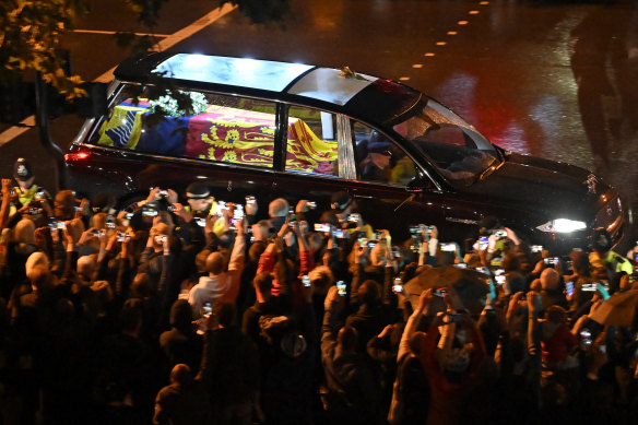 The coffin of Queen Elizabeth II is taken in a royal hearse to Buckingham Palace to lie at rest overnight in the Bow Room in London, England. 