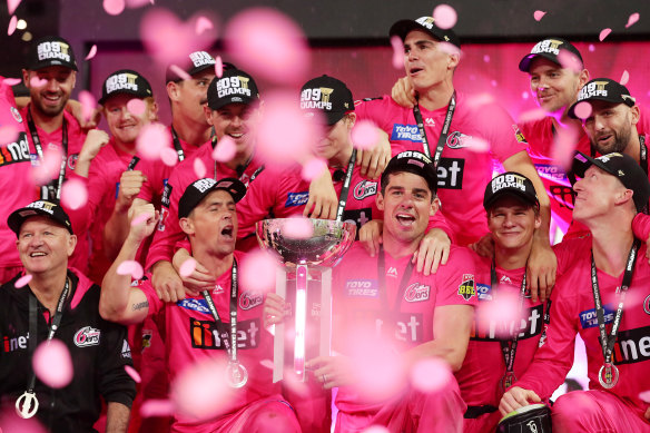 The Sydney Sixers celebrate winning last summer's BBL.