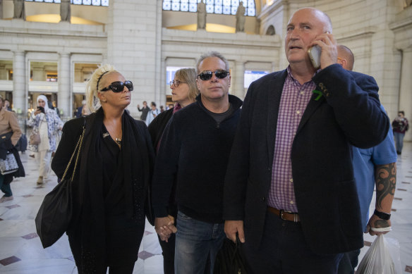 Charlotte Charles, left, mother of British teenager Harry Dunn, and her husband Bruce Charles, centre, arrive in Washington DC.