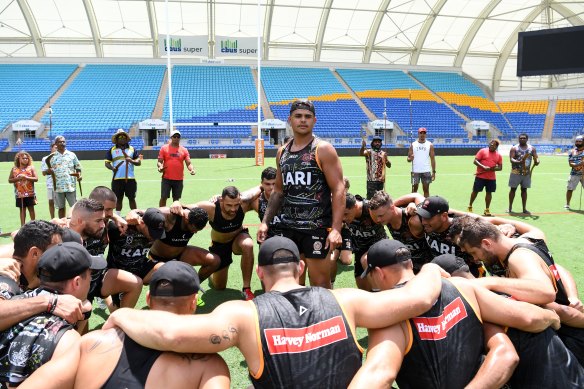 Latrell Mitchell and his Indigenous All Stars teammates practise the war cry they will perform before the All Stars clash on Saturday night.