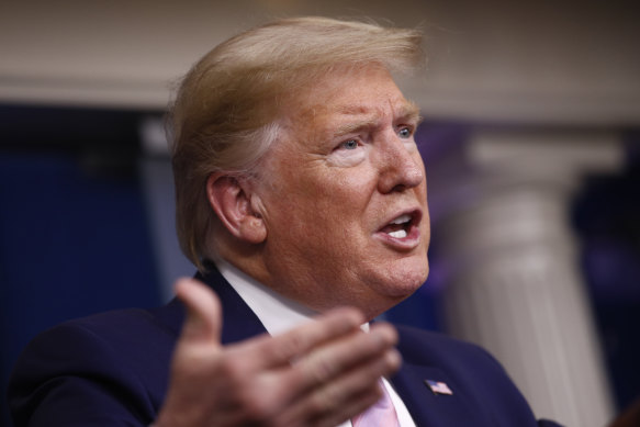 President Donald Trump speaks during a briefing at the White House on Saturday in Washington.