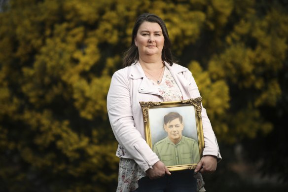 Jenni Rickard, of the Australian Parents Council, with a photo of her soldier grandfather.