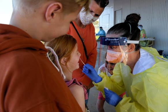 The McCauley family getting tested at the Dubbo West walk-in clinic.