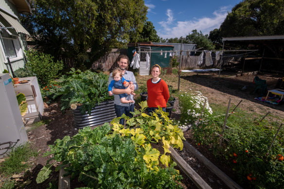 Zak Hamer, wife Erin Mould and son Reuben Hamer, in their garden in Castlemaine.