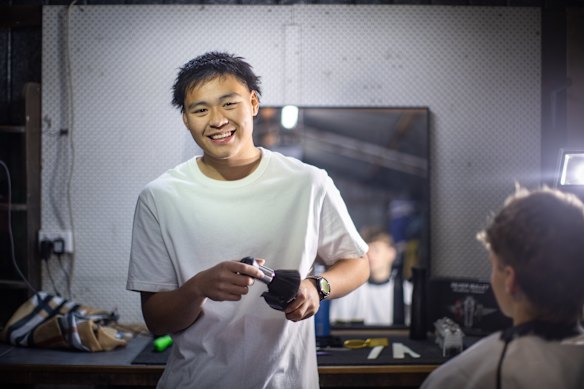Nathan Yin in his parents’ garage where he has set up his barber business Yinny Fadezz.