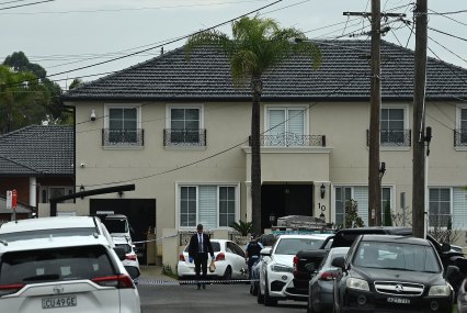 Police at Narelle Crescent in Greenacre where Mahmoud Ahmad was shot dead.