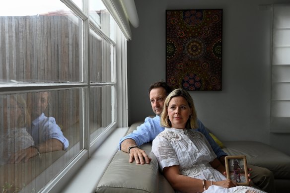 Elouise and Danny Massa at their North Balgowlah home with a picture of their son Joe, whose shock death at Northern Beaches Hospital in September has left the family demanding answers.
