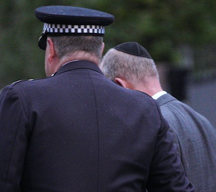 Chief Officer Sir Sir Stephen Watson visits the stage.