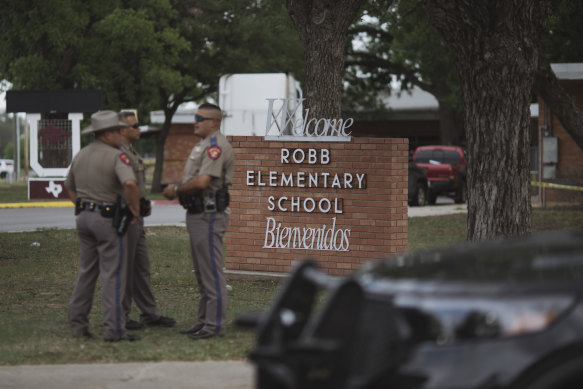 Texas state troopers outside Robb Elementary School in Uvalde.