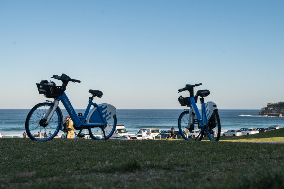 Share bikes in use in Bondi in July 2023.