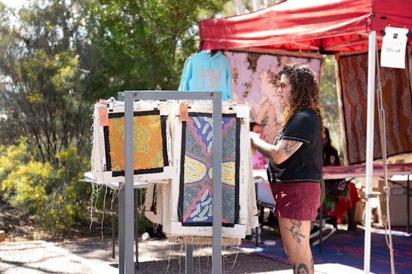 Shopping at the Desert Mob Art Market.
