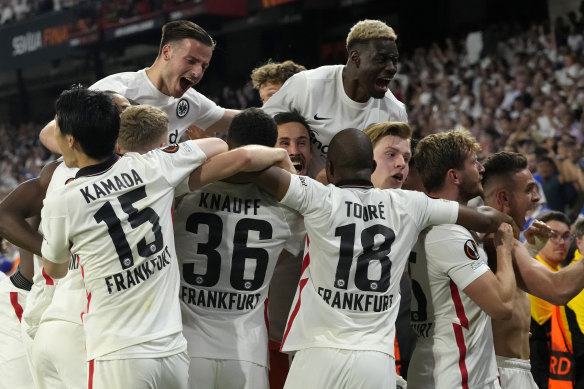 Eintracht Frankfurt players celebrate a first European title in more than 40 years.