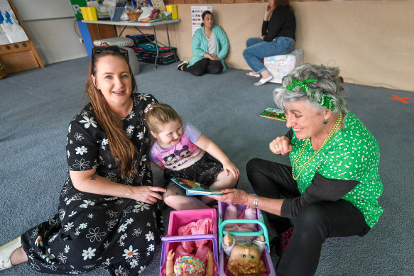 At play: Cassie Turner with daughter Arlie and early years support teacher Cathy Pianta. 
