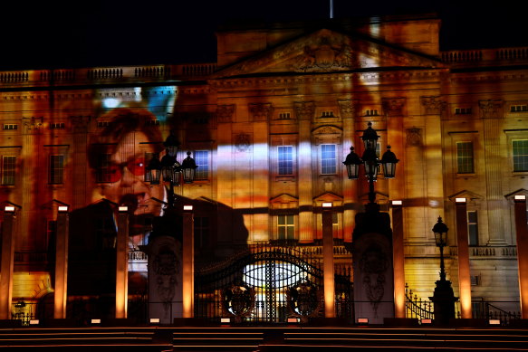 A projection of Elton John performing is seen during the Platinum Party At The Palace at Buckingham Palace.