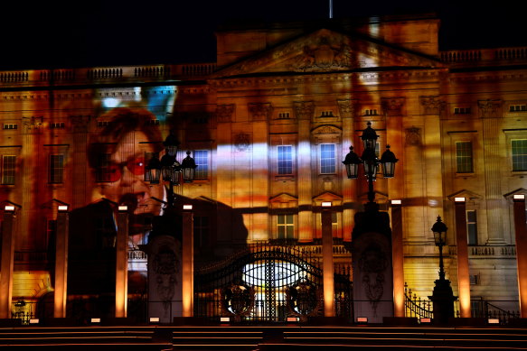 A projection of Elton John performing is seen during the Platinum Party At The Palace at Buckingham Palace.