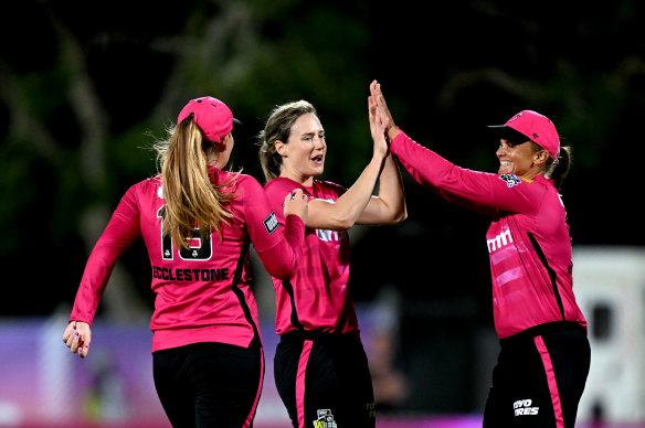 Sydney Sixers captain Ellyse Perry celebrates a wicket during her player of the match performance against the Brisbane Heat in Mackay. 