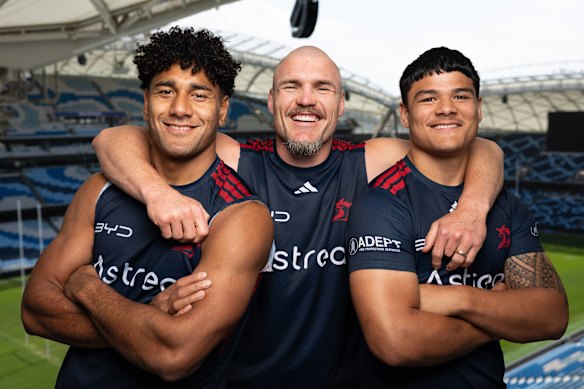Keep it in the Chookpen: Angus Crichton (centre) says the Roosters back-row stocks are in good hands with Siua Wong (left) and Salesi Foketi (right).