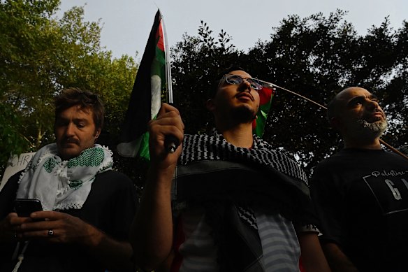 Protesters gathered Tuesday to condemn police's treatment of them at City Hall the night before.